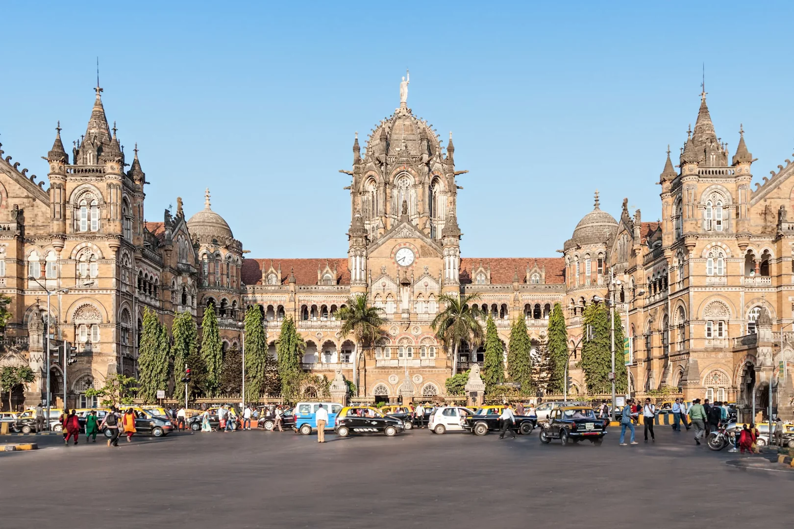 Formerly known as Victoria Terminus, this Gothic Revival masterpiece in Mumbai is an architectural gem. Its ornate façade, pointed arches, and intricate detailing make it a prime example of British colonial architecture in India. The station is not only a transportation hub but also a symbol of Mumbai's rich history.