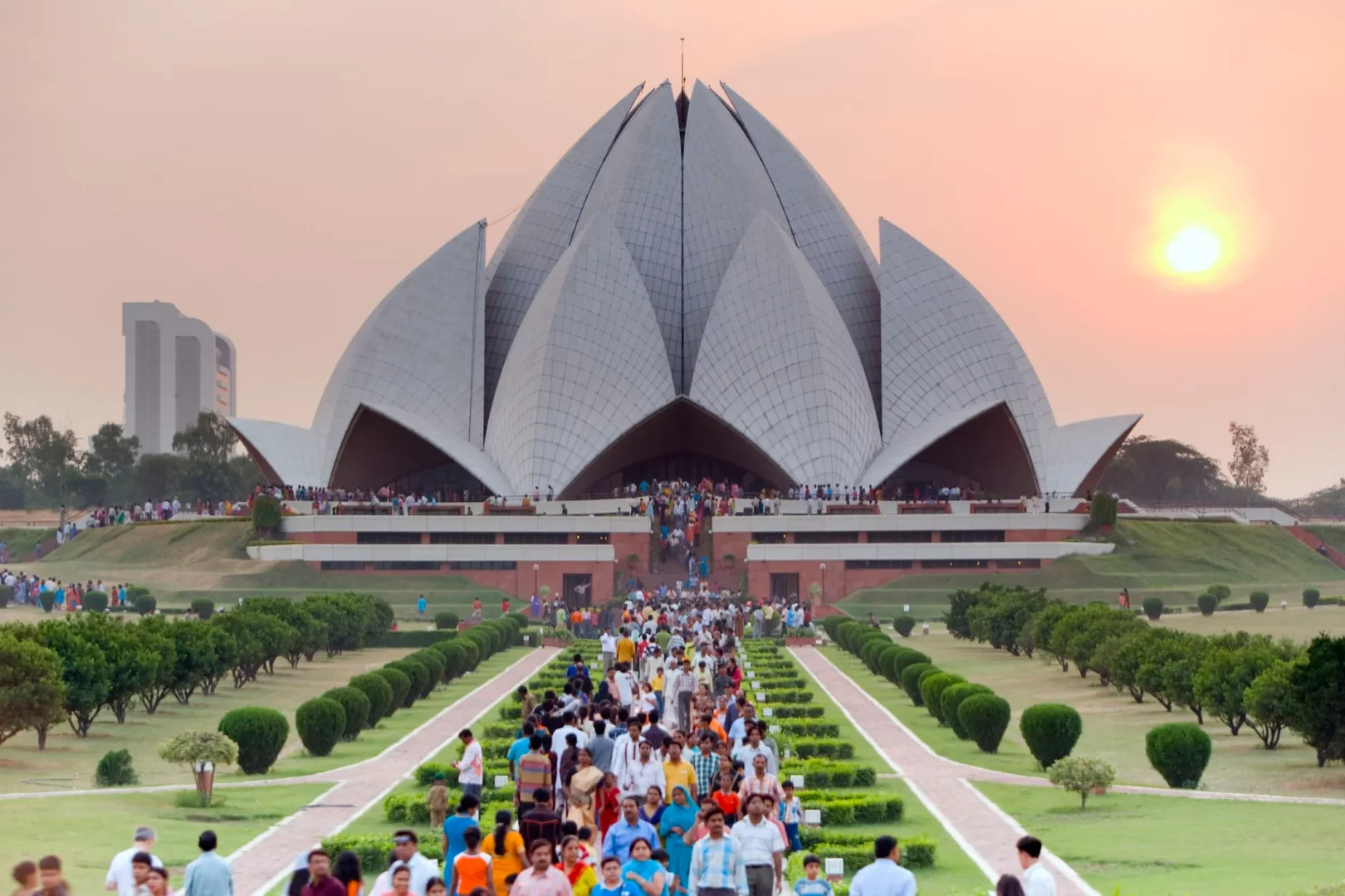 The Lotus Temple in Delhi is an architectural marvel that transcends religious boundaries. Designed in the shape of a lotus flower, it is a Bahá'í House of Worship known for its stunning lotus-shaped dome and serene ambiance. The temple promotes unity, peace, and the idea that all religions lead to one divine truth.